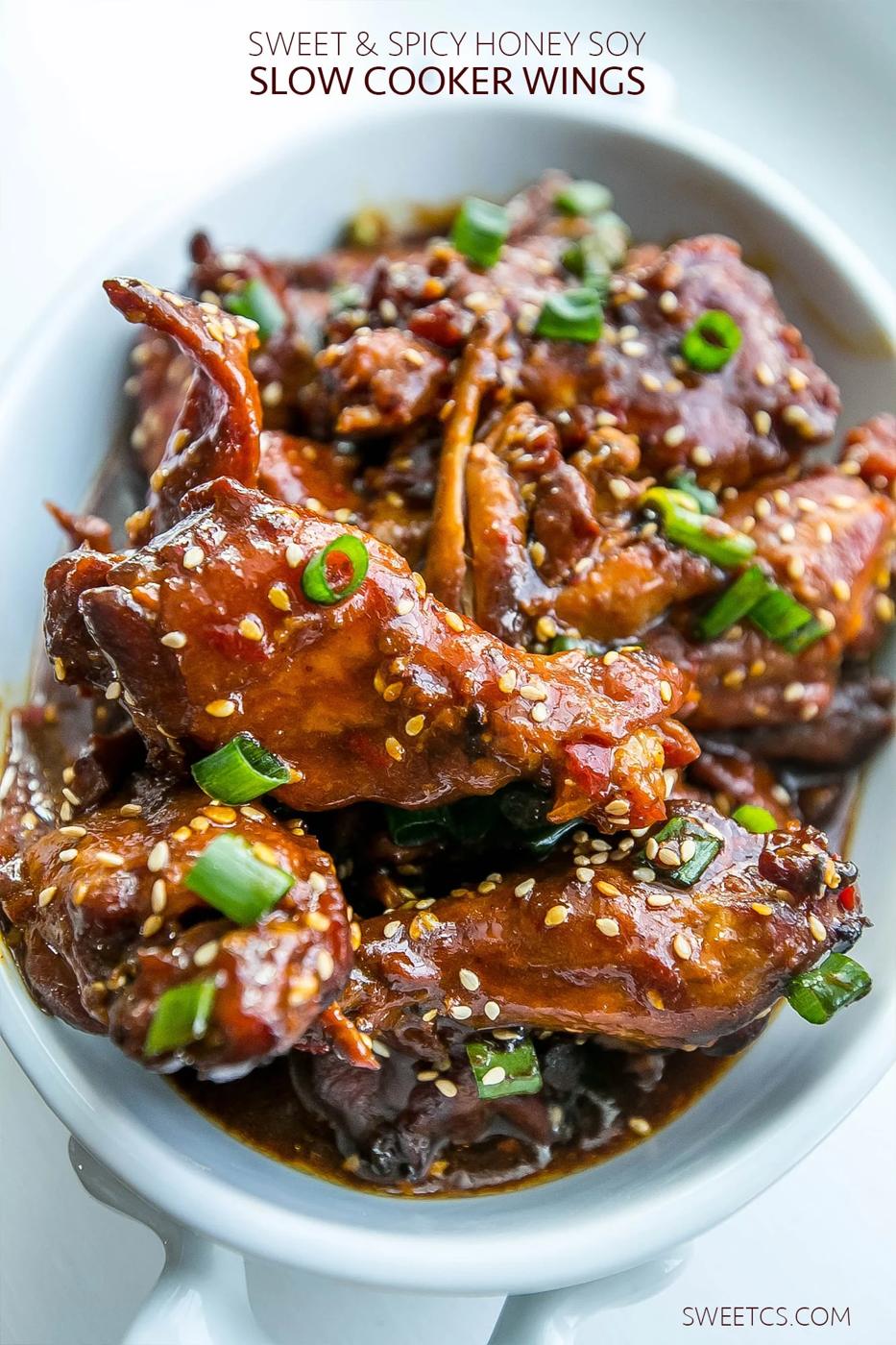 Sweet and sour honey soy chicken wings in a white bowl.