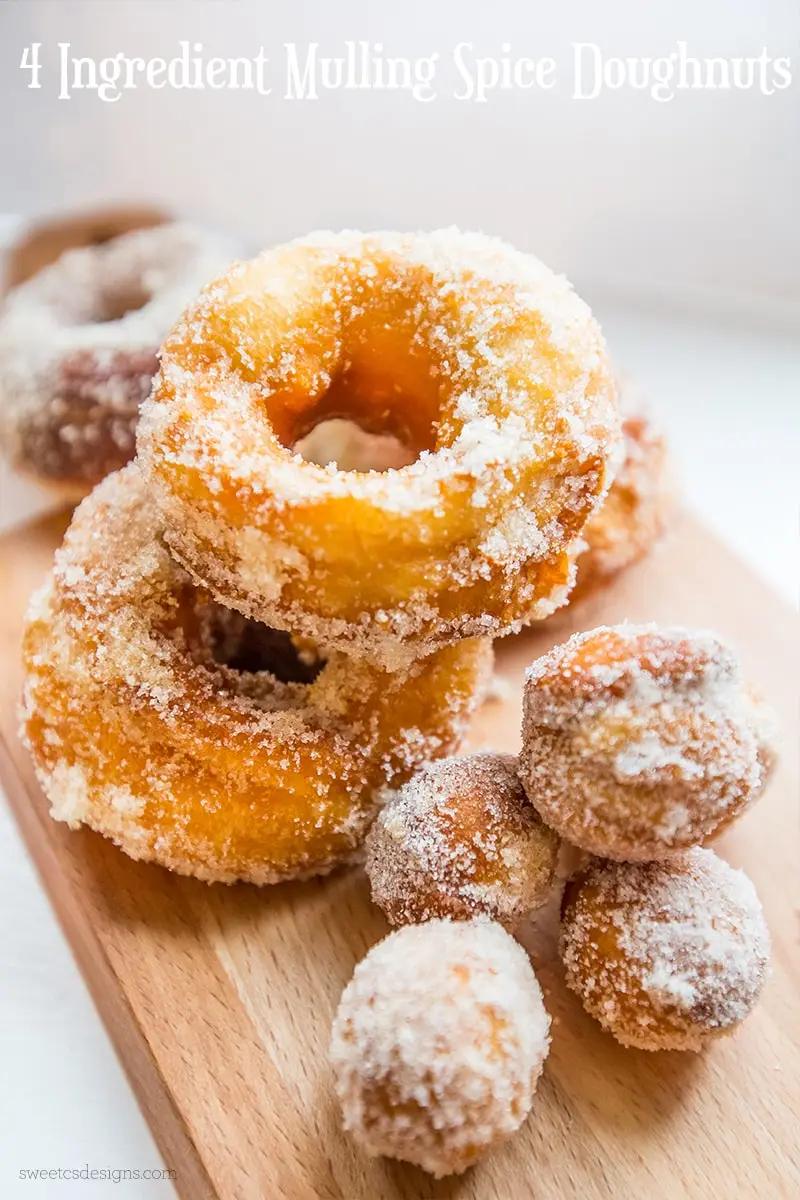 4 ingredient mulling spice donuts on a cutting board.