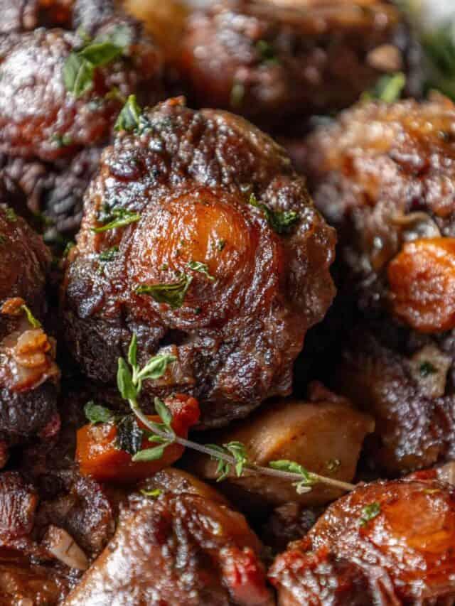 A close up of a dish with meat and vegetables.