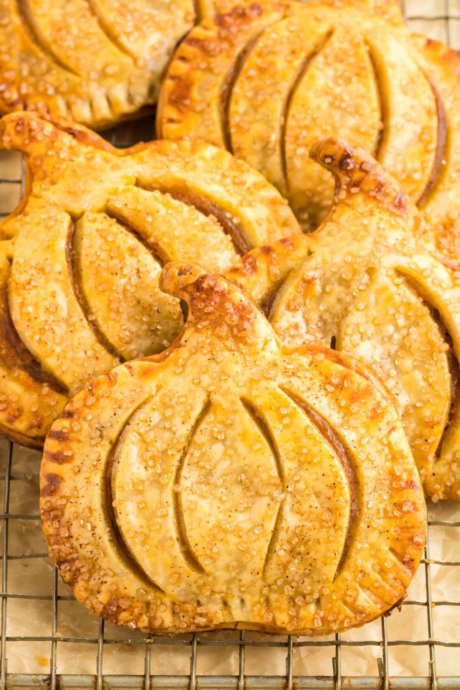 Easy baked pumpkin pies on a cooling rack.