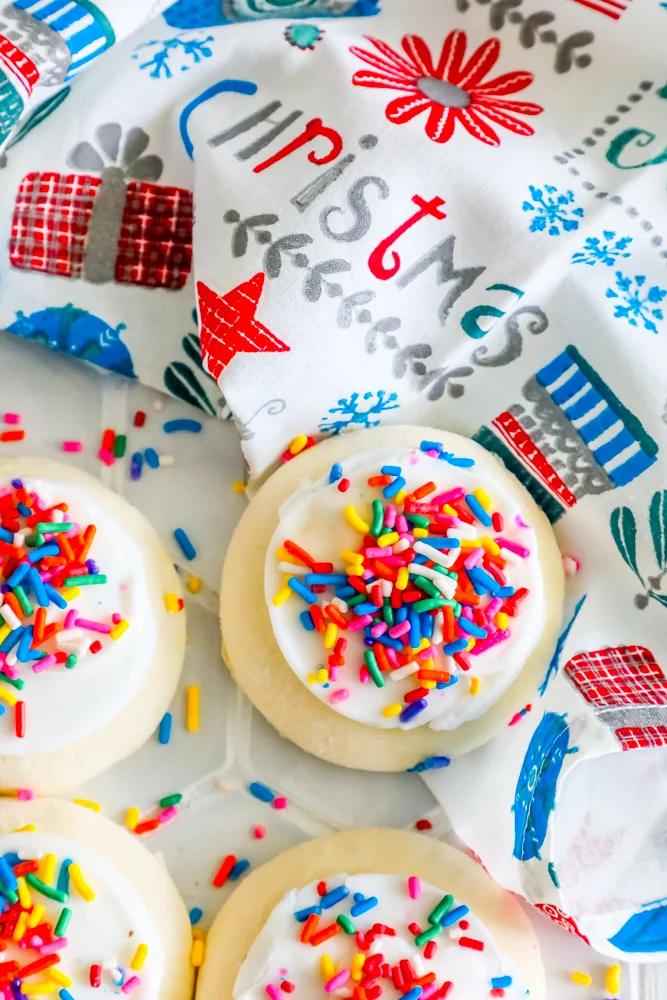 Christmas cookies with sprinkles on a baking sheet, easy recipe.