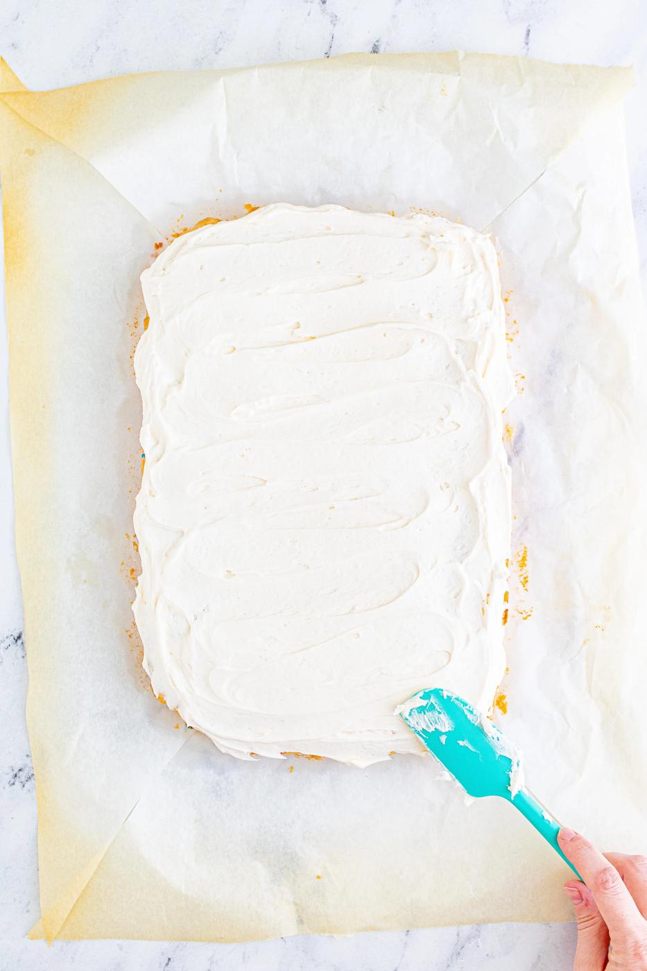tray bake covered in vanilla frosting