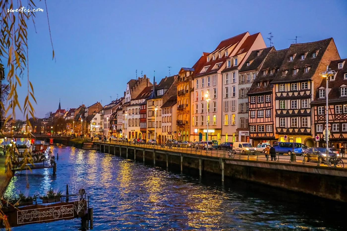 The city of Frankfurt, Germany illuminated at dusk during Christmas.