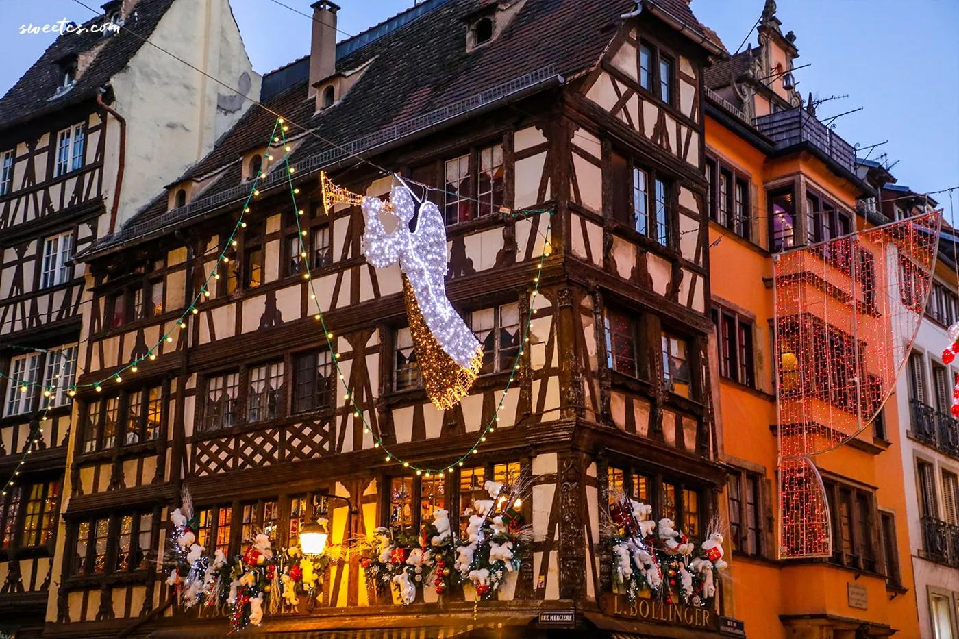 A building adorned for Christmas in the enchanting old town of Strasbourg, France.