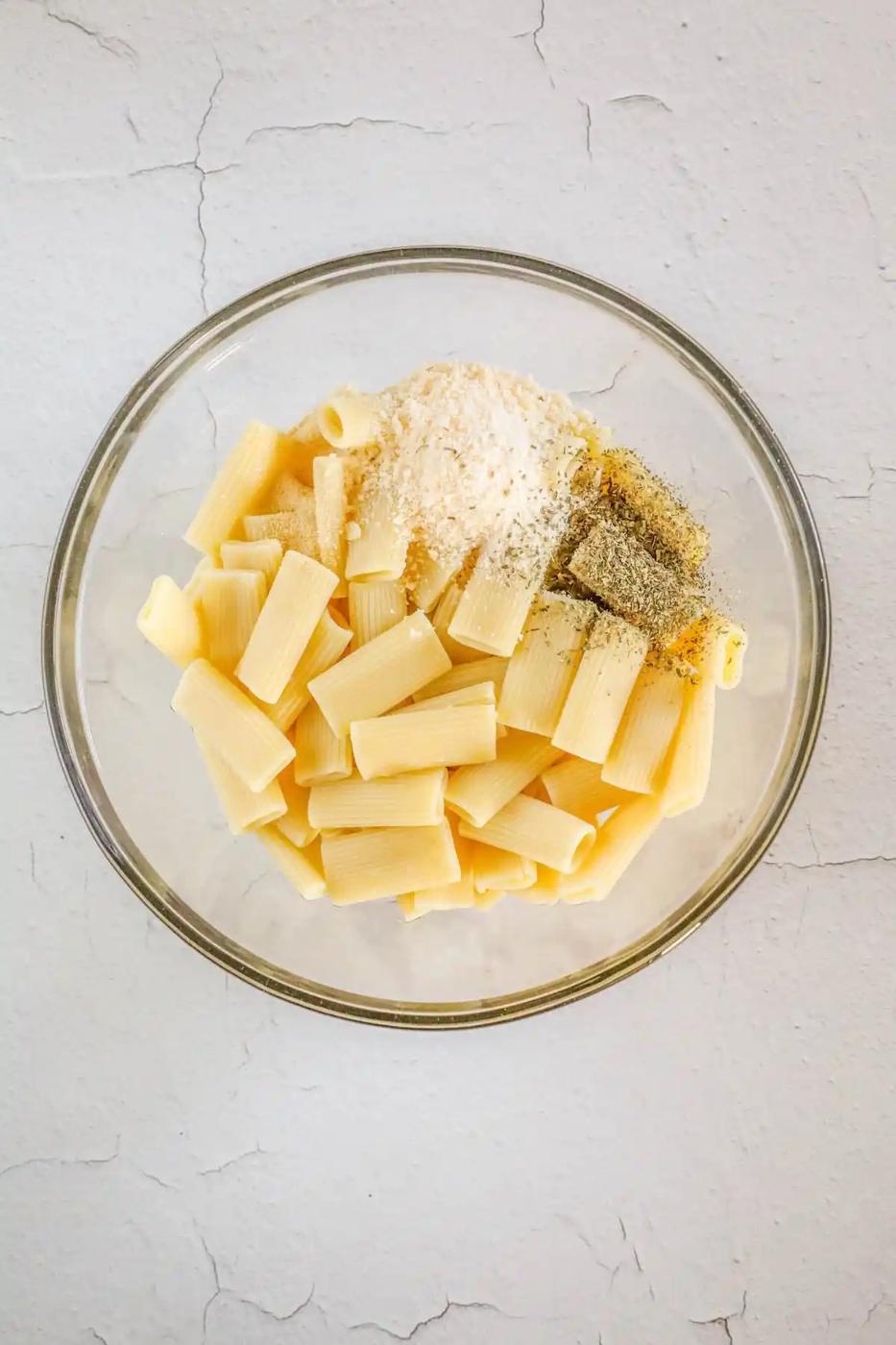 picture of pasta chips in a bowl with cheese and seasoning
