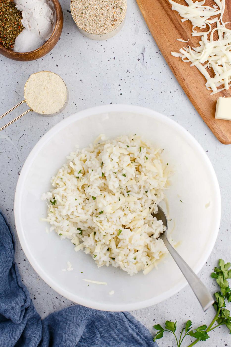 picture of rice and egg being mixed in a bowl