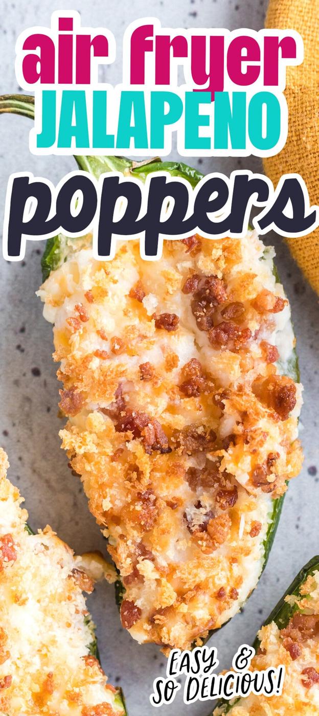 air fried browned jalapeño popper sliced in half and stacked on other jalapeño poppers on a plate