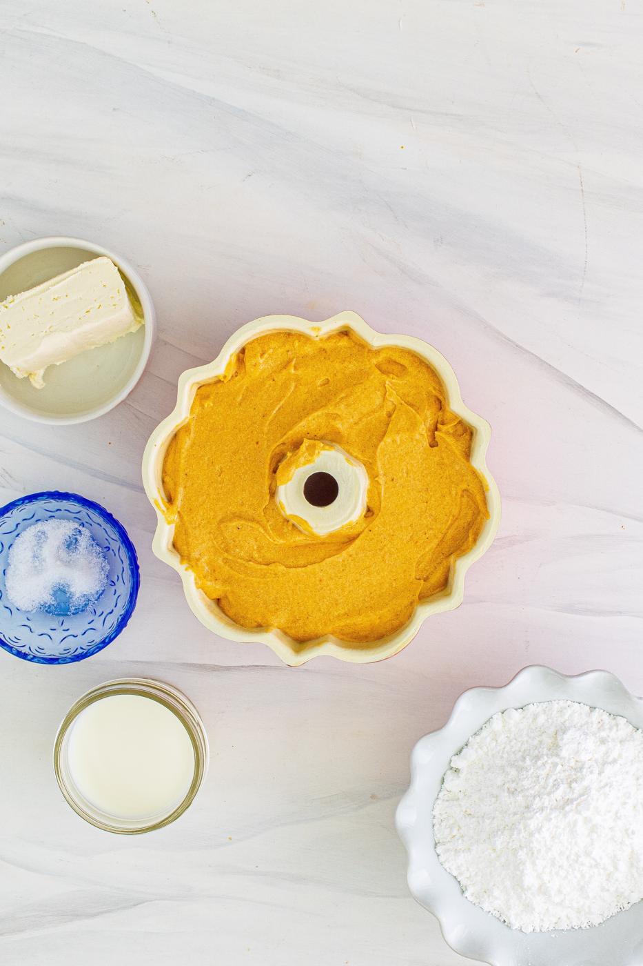 picture of pumpkin bundt cake batter in a bundt pan