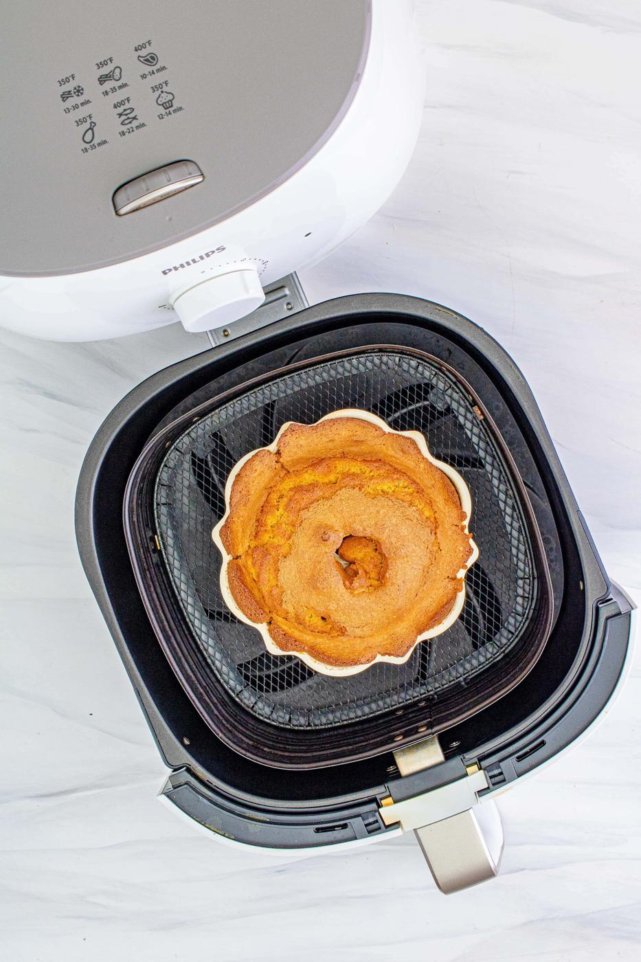 picture of baked bundt cake in an air fryer basket