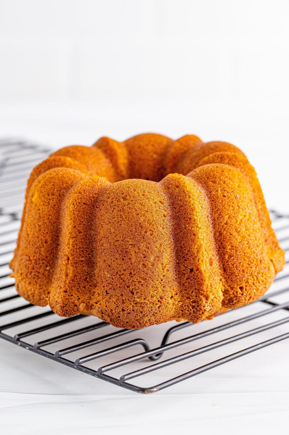 picture of pumpkin bundt cake on a cooling rack