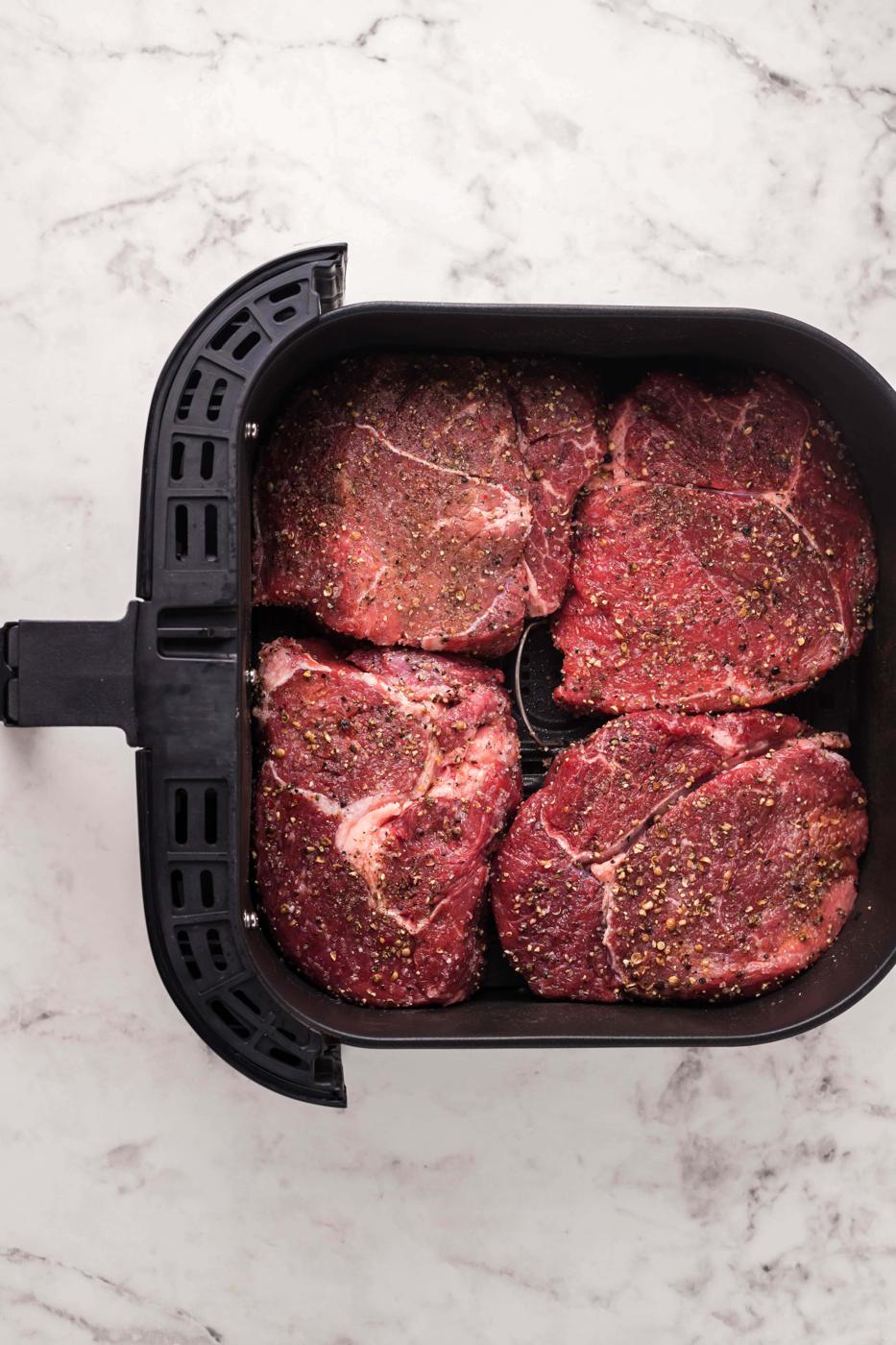 A Longhorn Steakhouse parmesan crusted steak cooked in an air fryer.