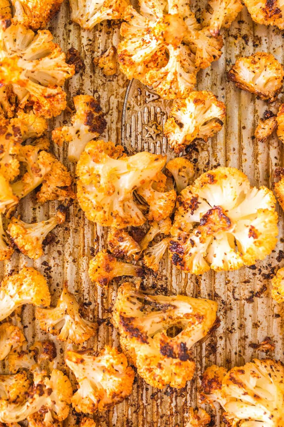 browned air fried cauliflower on a tray