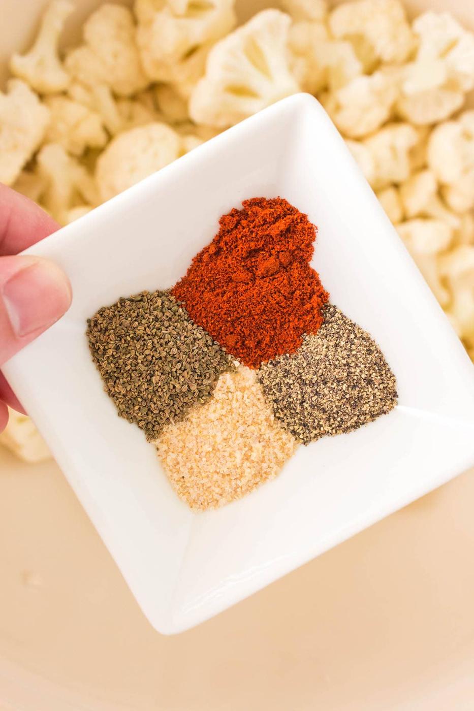 spices, salt, pepper in a bowl