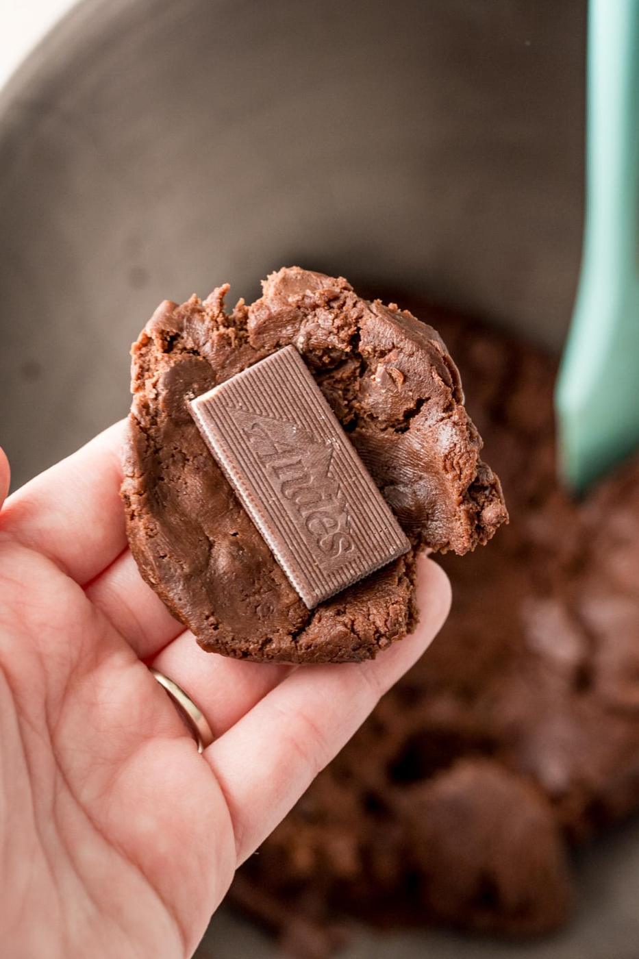 chocolate cookie dough flat with an andes mint on it