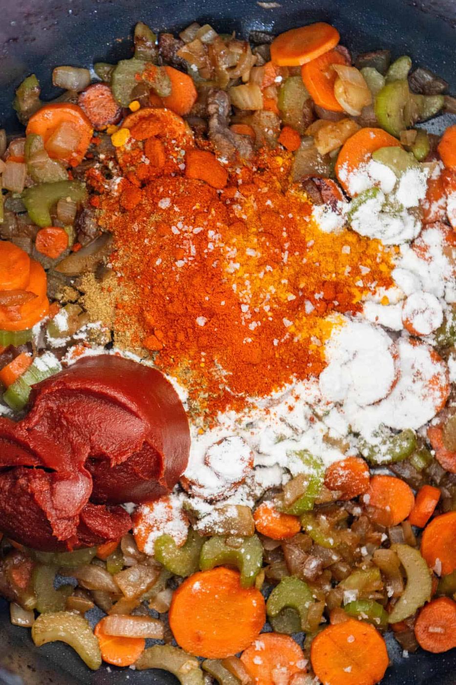 The Best Goulash recipe with carrots, onions, and spices in it.