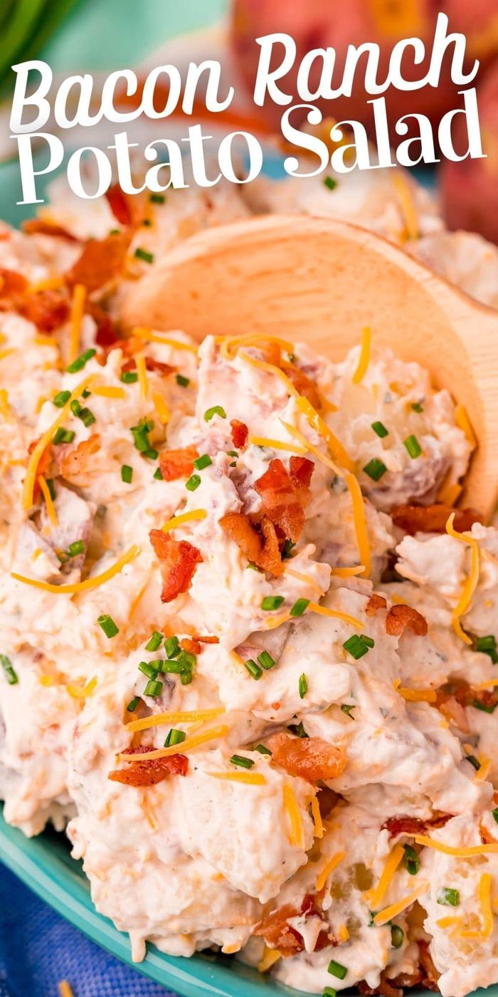 ranch potato salad in a blue bowl on a colorful towel