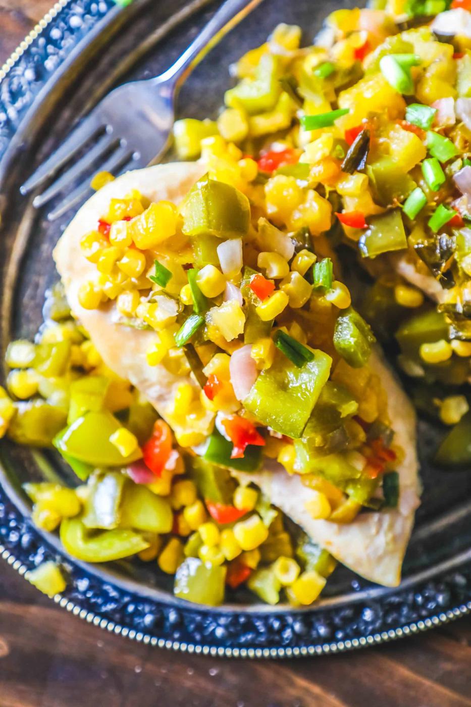 chicken topped with pineapple, pepper, corn, and green onions