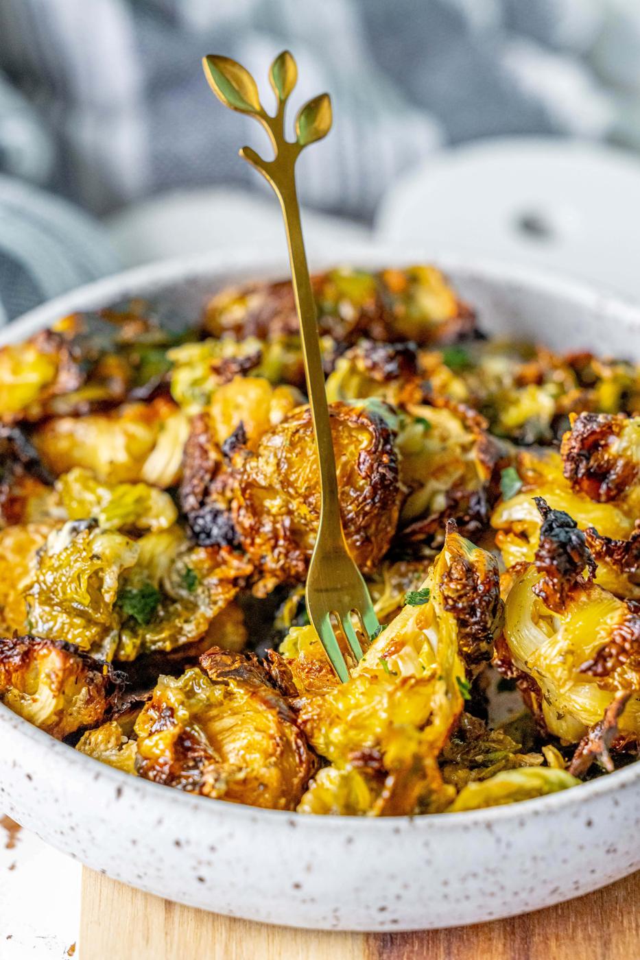 picture of caramelized ranch brussels sprouts in a white bowl