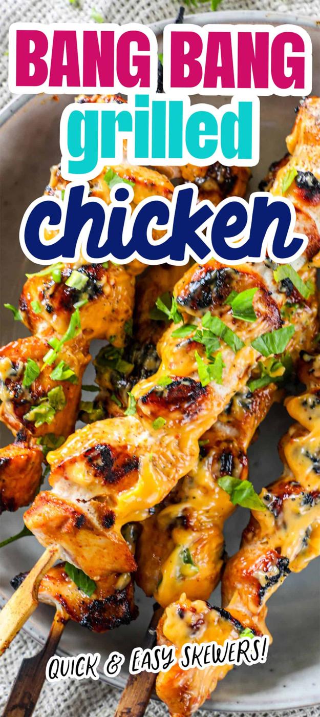 Close-up of grilled chicken skewers garnished with herbs, featuring text overlay reading "Bang Bang Grilled Chicken - Quick & Easy Skewers!.