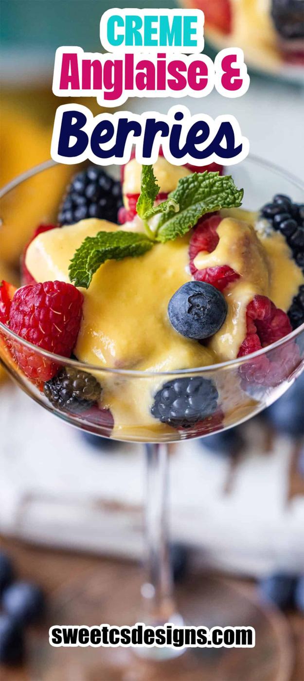 A glass filled with fresh raspberries, blackberries, and blueberries topped with yellow crème anglaise and a mint garnish. Text reads "Berries and Creme Anglaise" and "Ajpal designs.com".