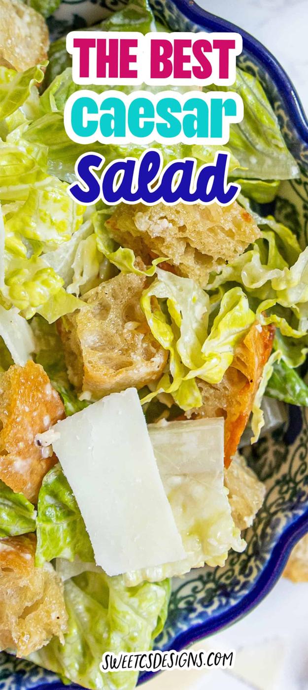 A bowl of Caesar salad with romaine lettuce, croutons, shaved Parmesan cheese, and creamy Caesar dressing, topped with a text overlay that reads "The Best Caesar Salad" and "sweetsdesigns.com".