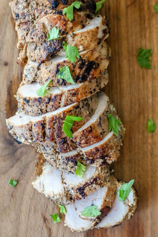 picture of pork tenderloin slices on a cutting board