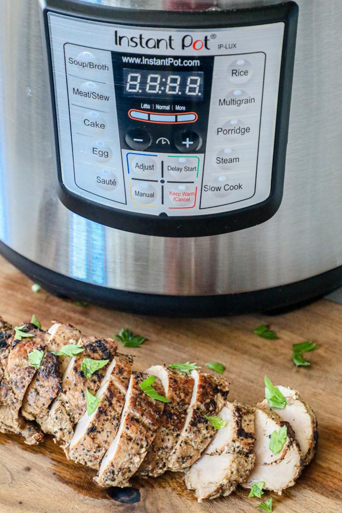 picture of pork tenderloin slices on a cutting board