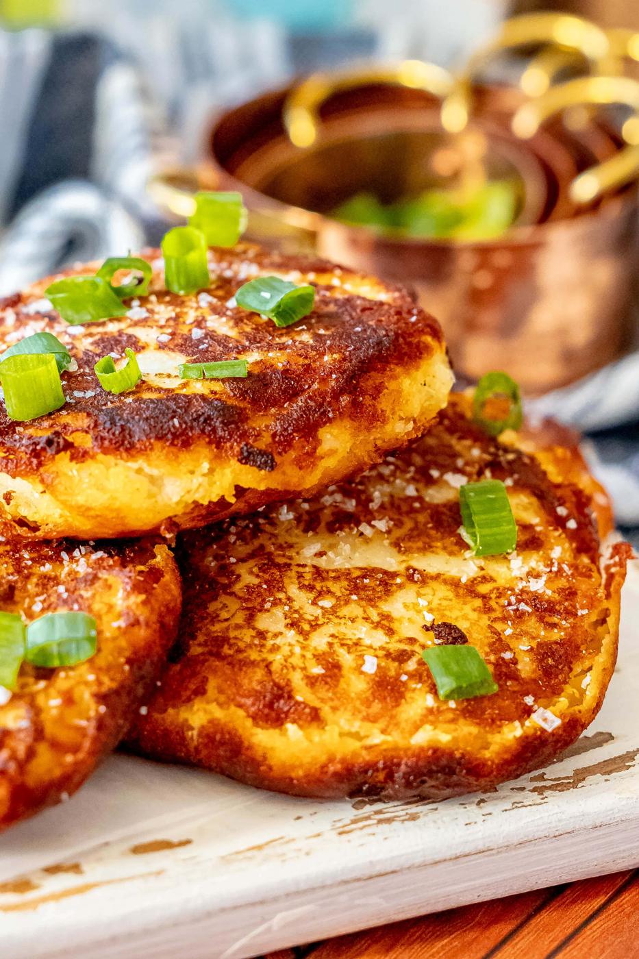A plate with a stack of Irish potato pancakes.