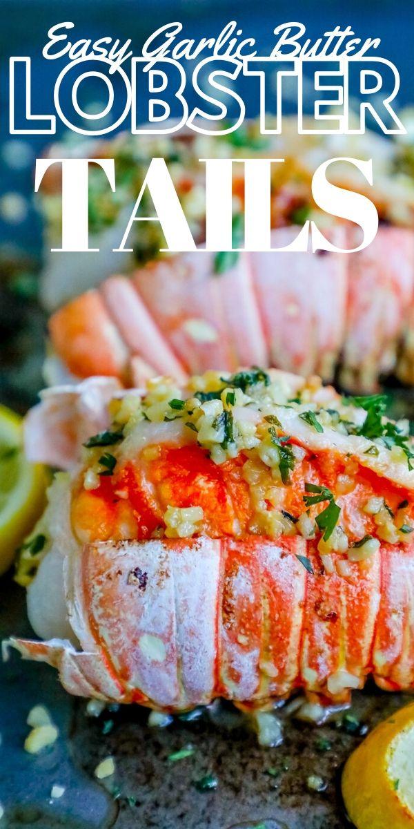 picture of lobster on baking sheet with lemon and parsley on top