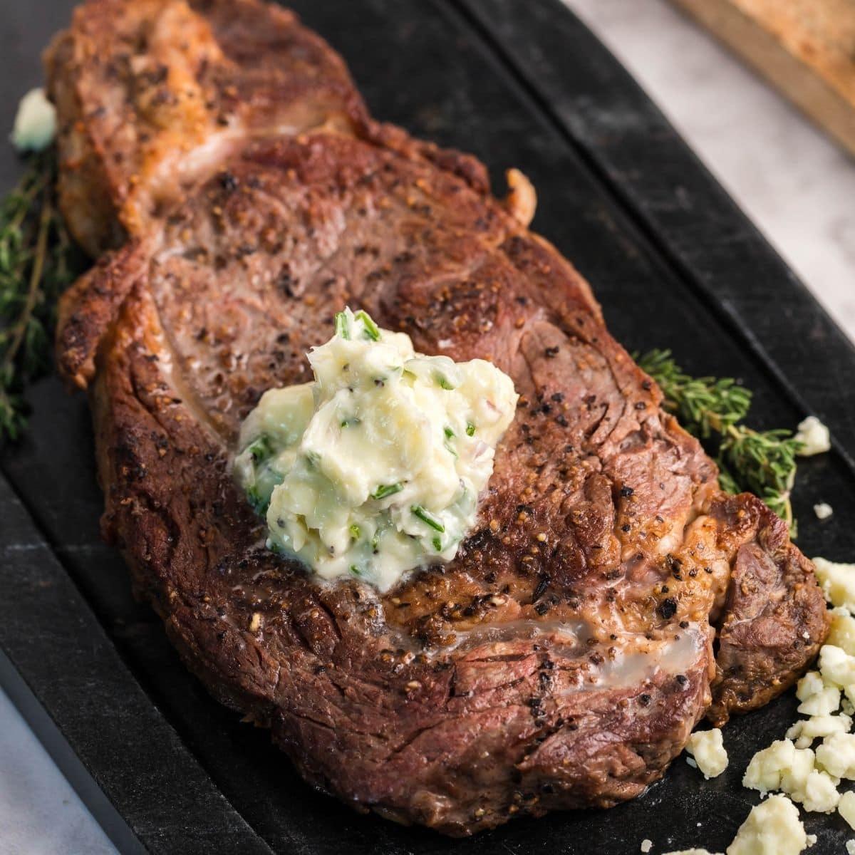 New York Strips with Blue Cheese Butter