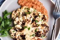 Effortless Cauliflower Steaks with Tangy Red Pepper Sauce