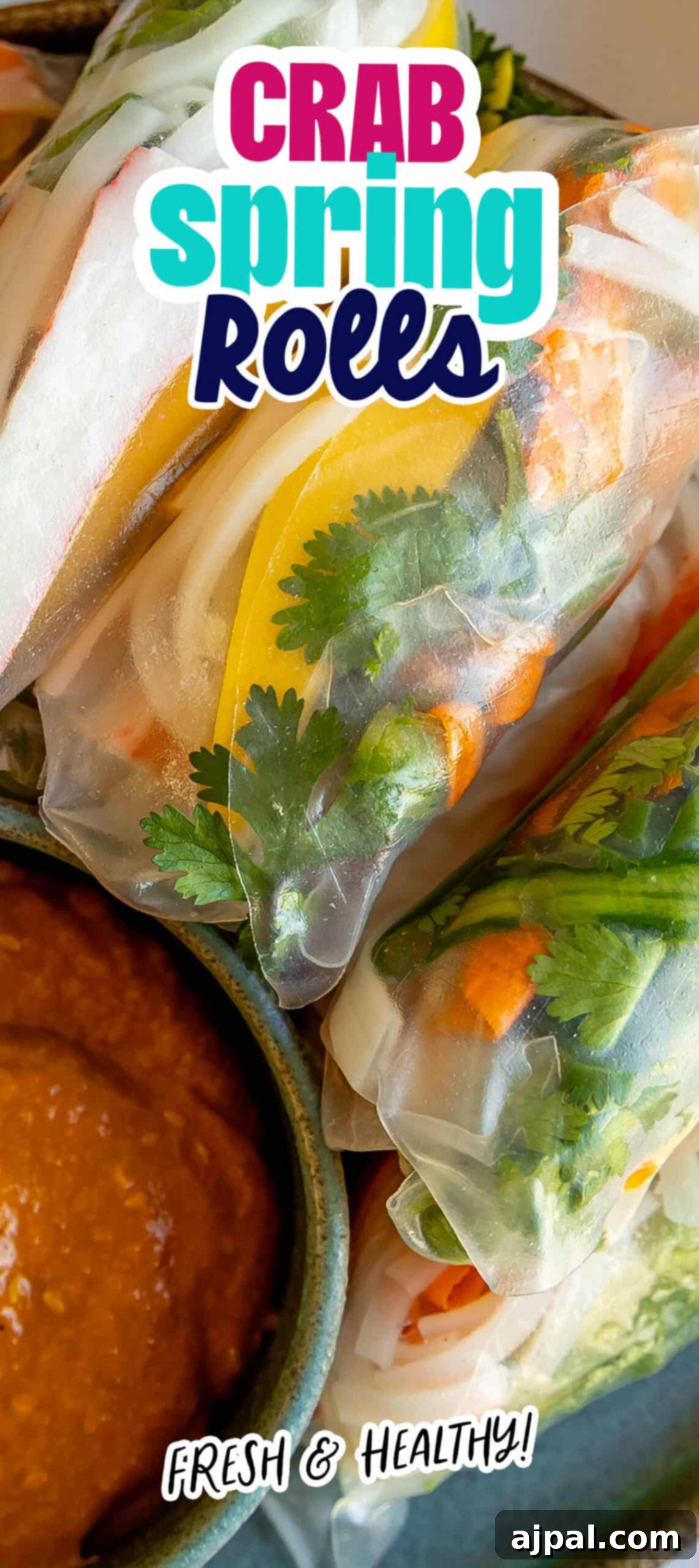 Crab spring rolls with a delicious dipping sauce on a plate.