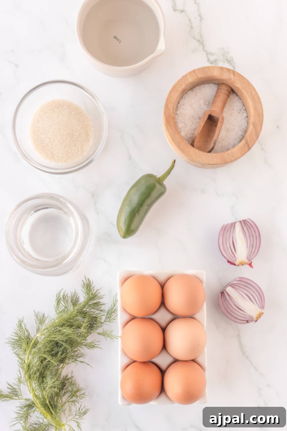 Pickled eggs on a marble table, ready to be enjoyed.