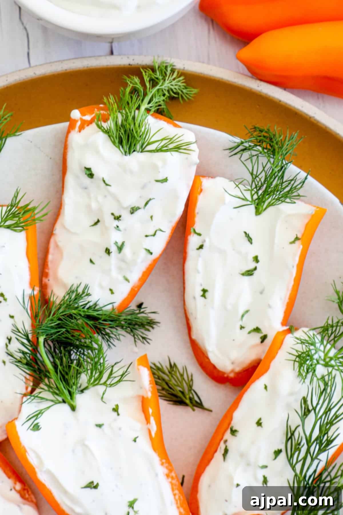 A plate of food with a creamy white sauce on it.