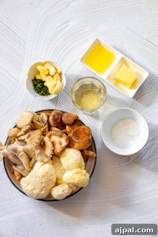 picture of garlic, herbs, butter, olive oil, wine, salt, and mushrooms on a table