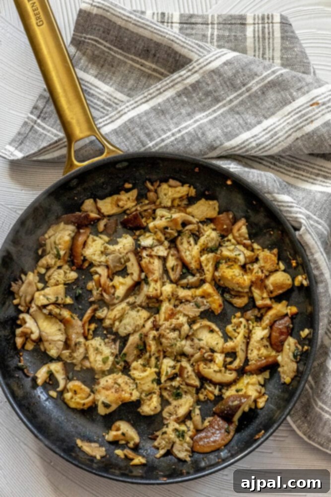 picture of browned mushrooms in a pan 