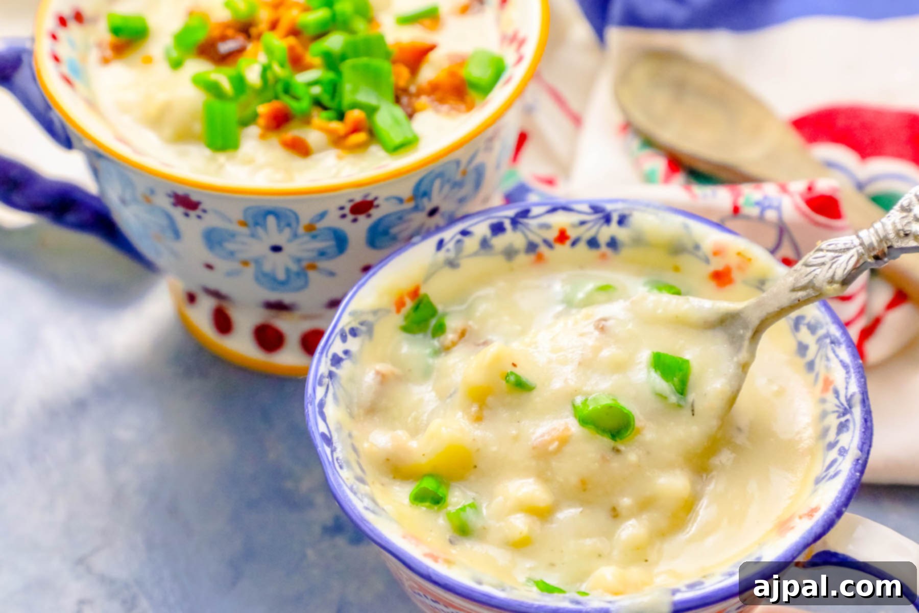 Simple Loaded Mashed Potato Revival Soup 4 creamy potato soup with peas and bacon in a bowl