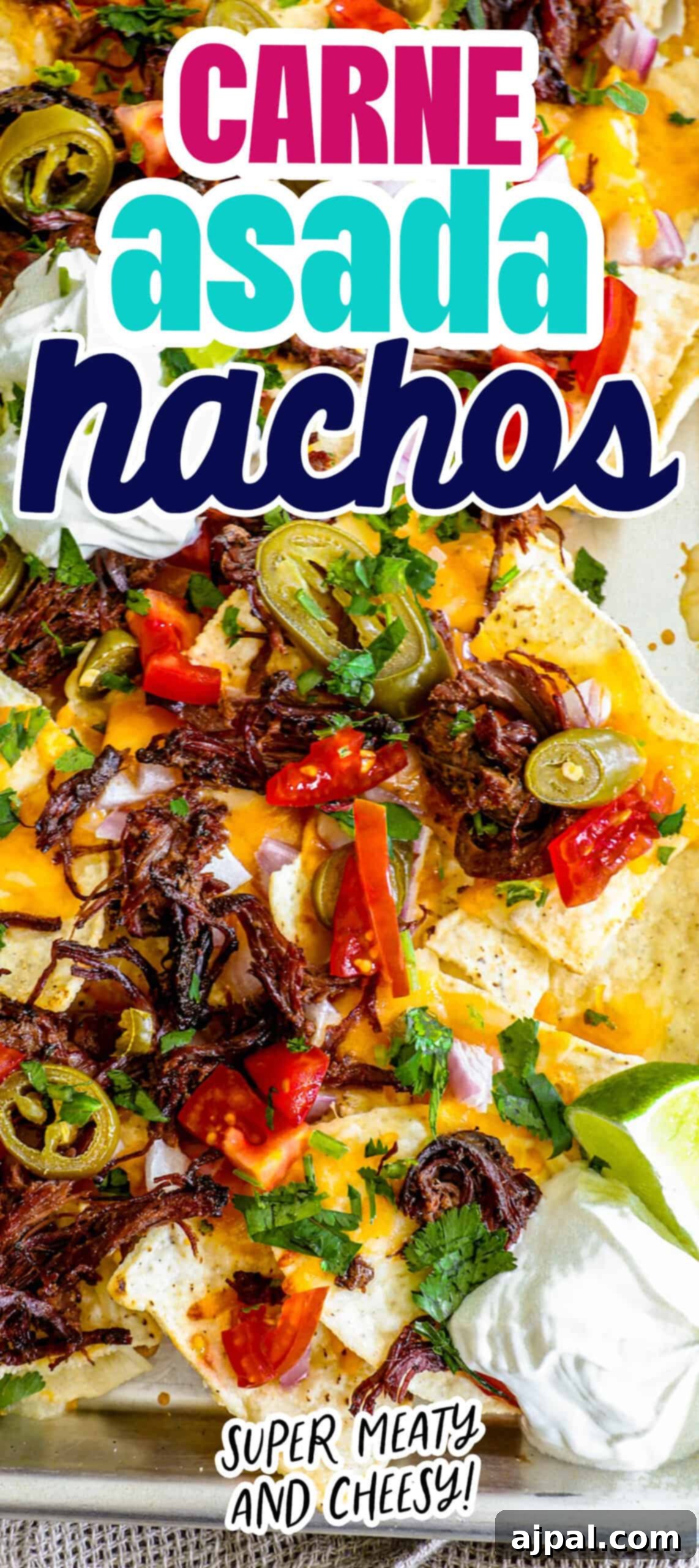 Loaded Carne Asada Nachos 8 A vertically oriented image showing a vibrant tray of carne asada nachos, garnished with fresh cilantro, lime wedges, and other colorful toppings, against a rustic background.