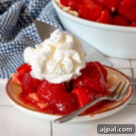 Sweet Summer Strawberry Pie 9 pie with strawberries on it and cream