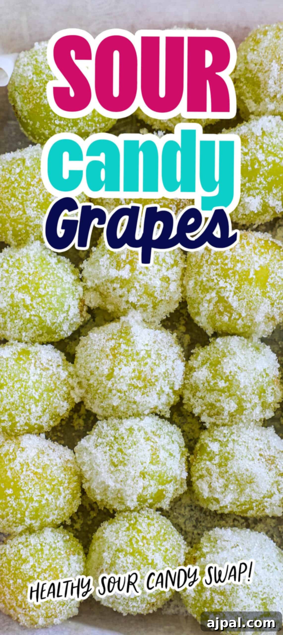 Zingy Sweet Grapes 10 A bowl of sour candy-coated grapes with text labels "sour candy grapes" and "healthy sour candy swap!" above.