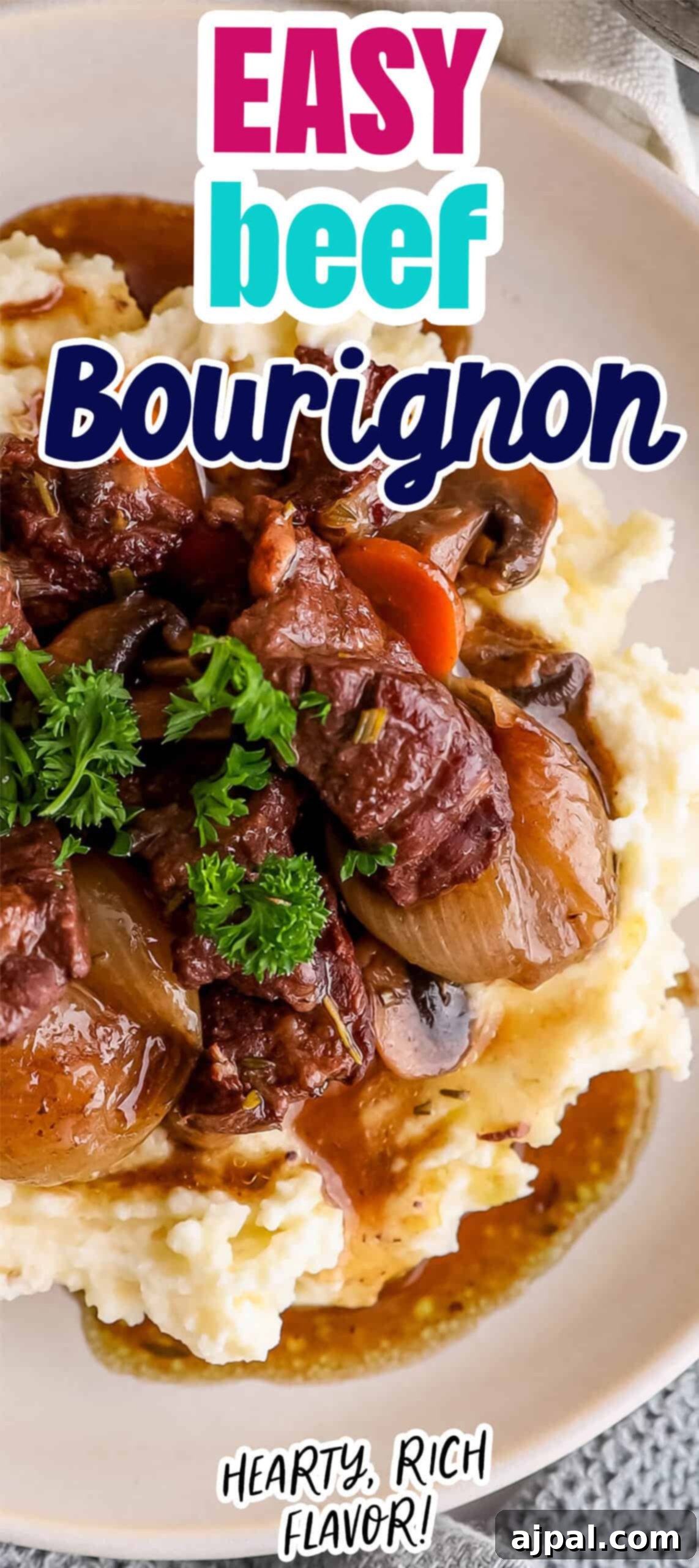 A mouth-watering bowl of Beef Bourguignon, artfully served over a bed of creamy mashed potatoes and garnished with fresh parsley. The image is enhanced with text overlays promoting it as "Easy Beef Bourguignon" and highlighting its "Hearty, Rich Flavor!."