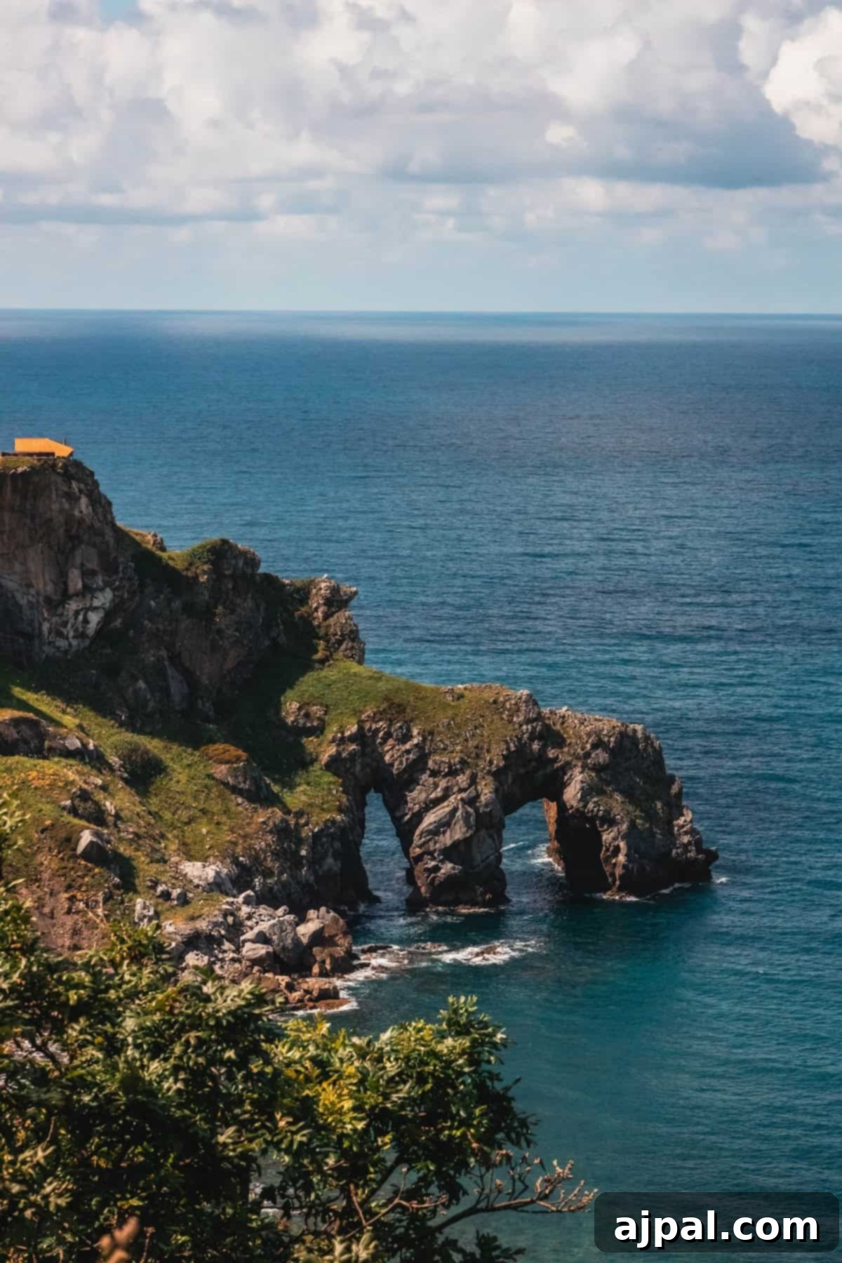 Bilbao: A Comprehensive Travel Guide 4 The iconic winding pathway and steps leading to the hermitage of San Juan de Gaztelugatxe, offering breathtaking views of the rugged coastline – a must-see for any Bilbao visitor.