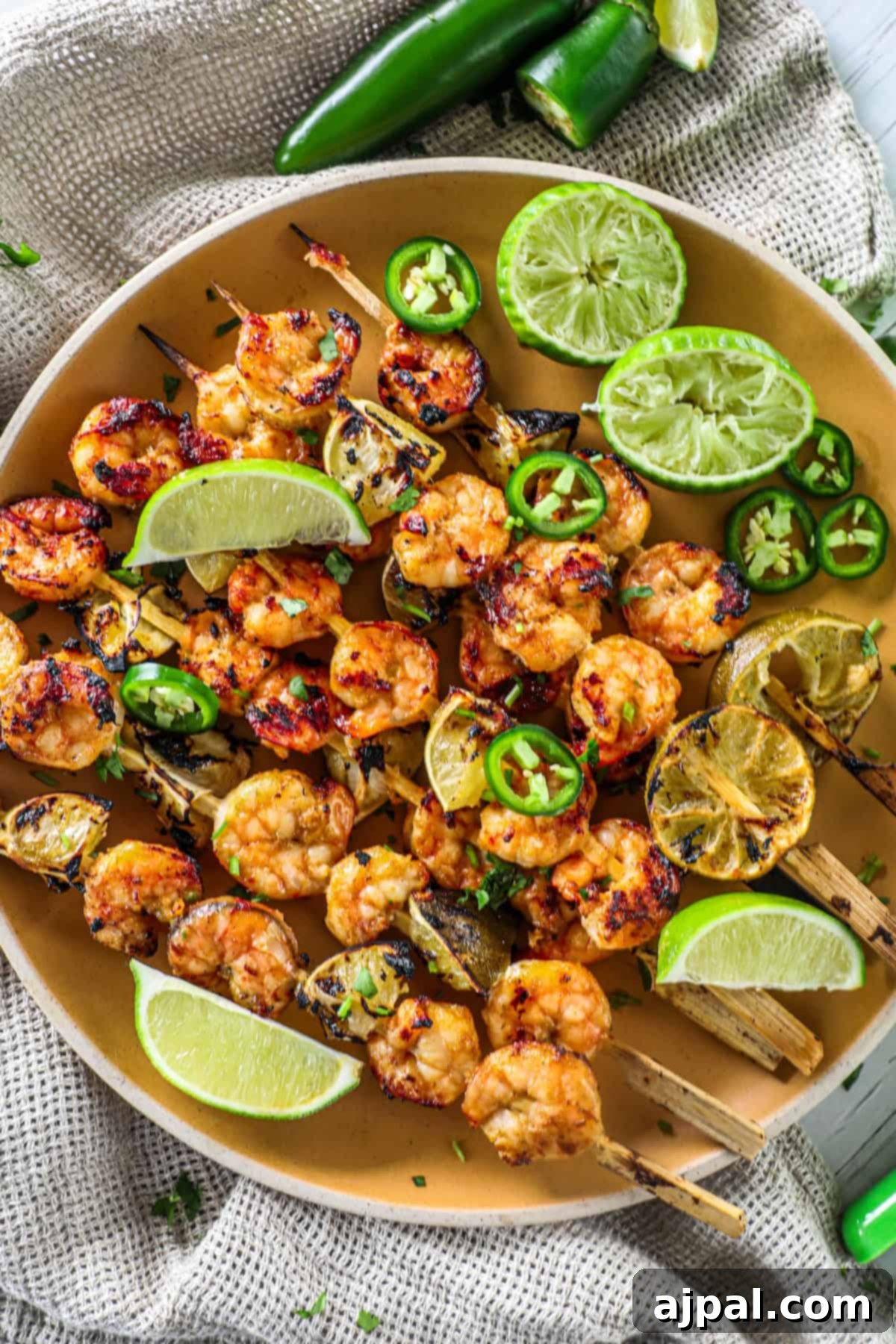 Zesty Margarita Grilled Shrimp 5 A close-up of grilled margarita shrimp with fresh cilantro and lime, ready to be served.