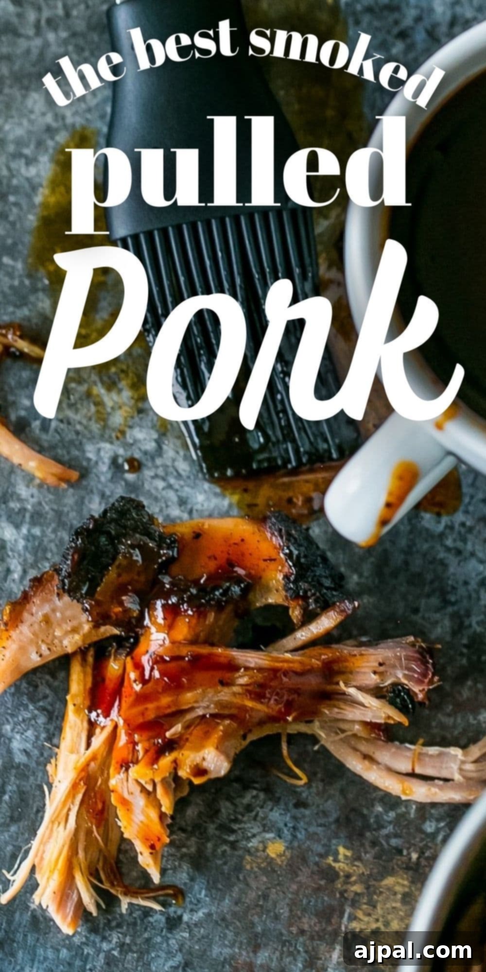 Pulled pork with BBQ sauce on it and a brush, showcasing the delicious glaze.
