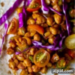 Chickpea burritos served on a white plate, perfect for vegans.