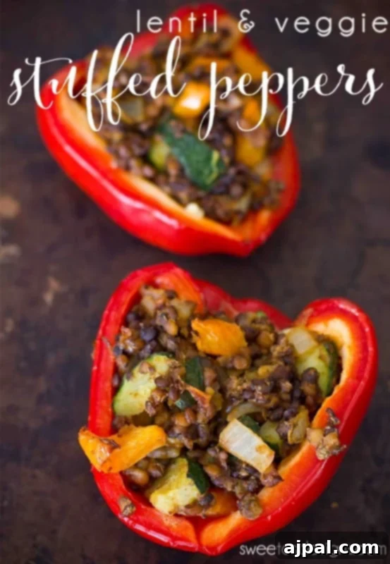 Flavor-Packed Vegan Lentil & Veggie Stuffed Peppers 2 Hearty vegan lentil and vegetable stuffed peppers on a plate