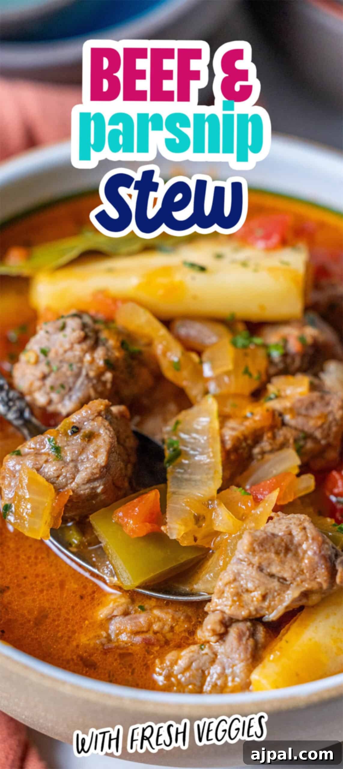 A mouth-watering bowl of tomato beef and parsnip stew featuring generous chunks of beef, parsnip, tomato, onion, and fresh herbs. The accompanying text reads, "Beef & Parsnip Stew with Fresh Veggies." This image highlights the wholesome and comforting nature of the dish.