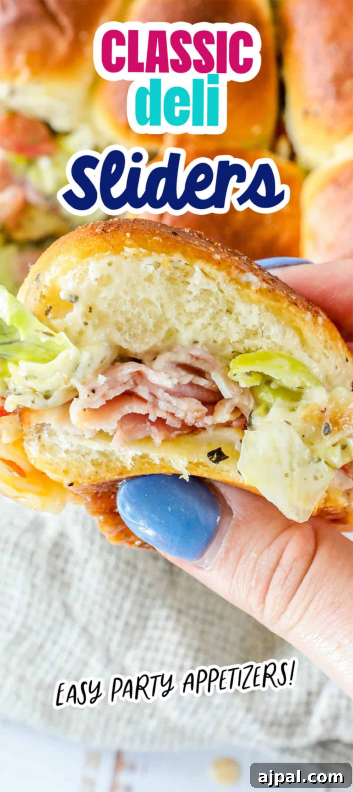 Close-up of a hand holding a deli slider with ham, lettuce, and sauce. Nail polish is blue. Text on image reads, "CLASSIC deli Sliders" and "EASY PARTY APPETIZERS!.