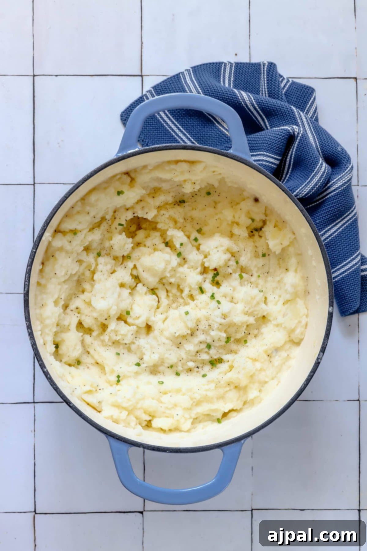 Classic Scottish Tattie Scones 7 Easy creamy mashed potatoes in a blue pot on a tiled floor.