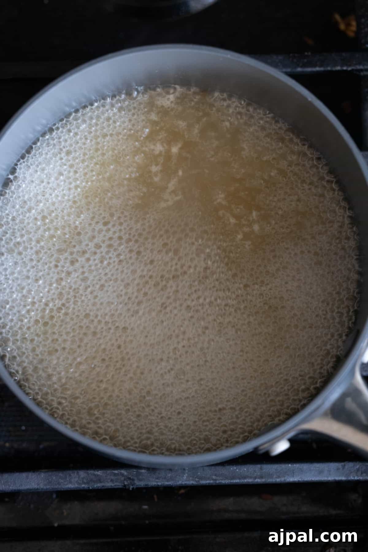 Spicy Mediterranean Cured Lemon Couscous 6 A pot of boiling water on a stove is essential for making couscous.